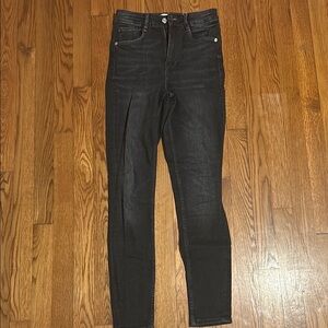 High Rise Black Jeans with Tapered Leg and Smooth Denim